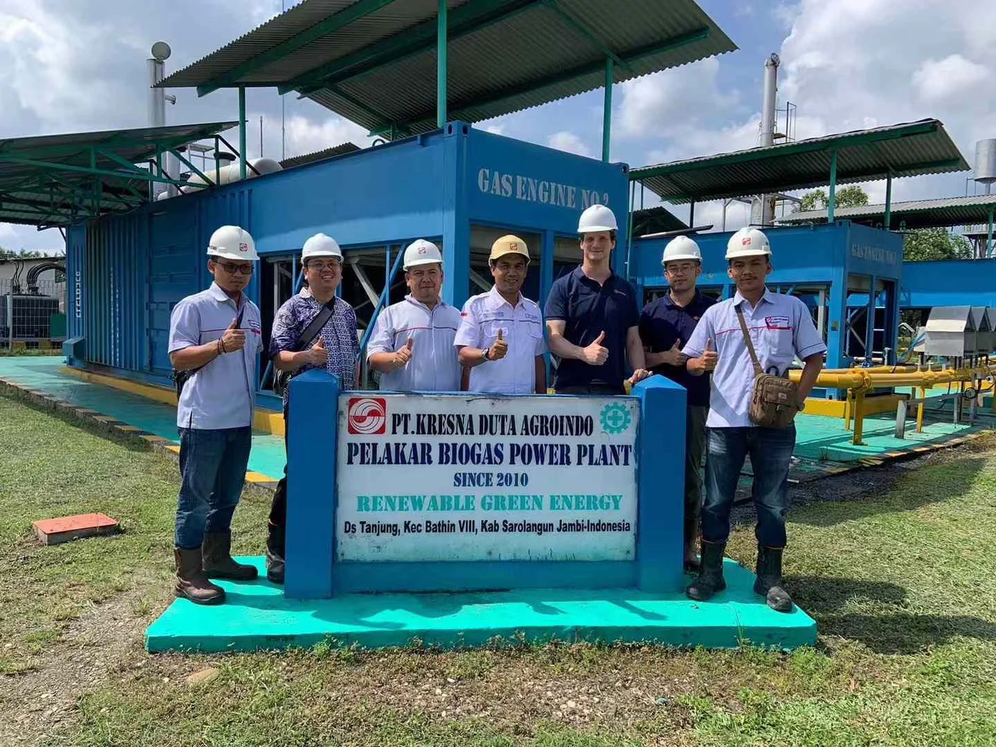 倍奇能源 and partners at an Indonesian palm oil mill