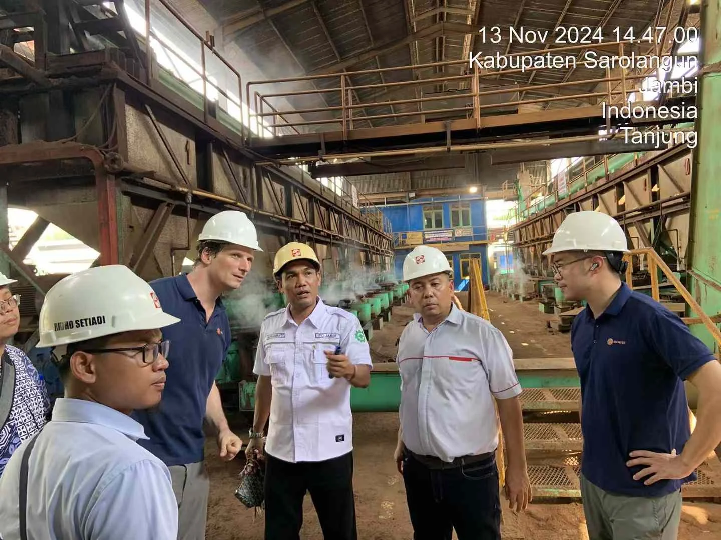 倍奇能源 and partners visiting an Indonesian palm oil mill in November 2024